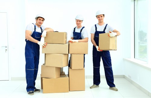 Office furniture removal with desks and chairs being loaded