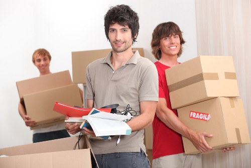 Office furniture being prepared for removal in a workplace