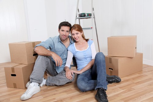 Careful handling of a large wardrobe during a furniture removal service