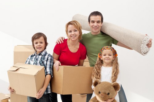 Customers reviewing a furniture removal service quotation and schedule