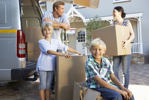 Household furniture being loaded into a moving van