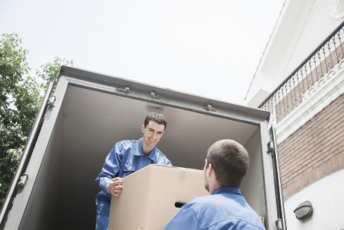 Low-carbon van used for eco-friendly furniture removals in an urban area