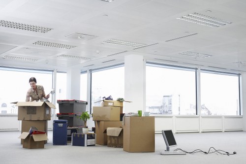 Furniture delivery service with protective moving equipment