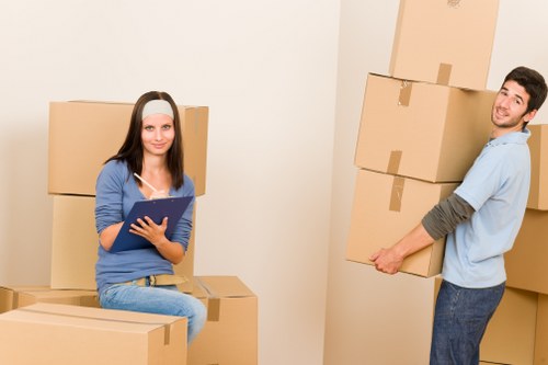 Team handling bulky furniture during an apartment move