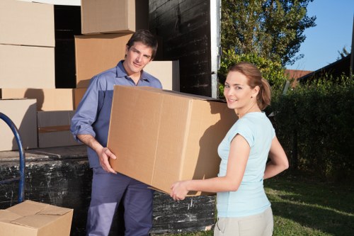 Wrapped wooden furniture secured inside a moving truck